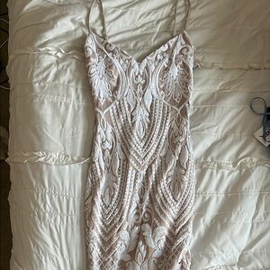 Mini nude formal dress with white bead detailing
